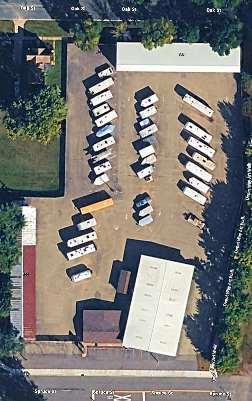 Aerial view of the paved and covered Downtown Storage lot in Farmington